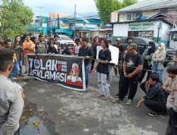Aliansi Peduli Lingkungan Gelar Aksi Minta Polda Sulut Tindak Tegas Reklamasi di Teluk Manado