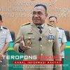 Peringati Hantaru ke-66, Kanwil ATR/BPN Sulut Serahkan Sertipikat Gratis Secara Door to Door
