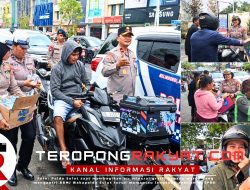 Redakan Dahaga di Bawah Terik Matahari, Senyum Merekah Warga Manado Saat Polisi Bagikan Air Gratis di Antrean BBM